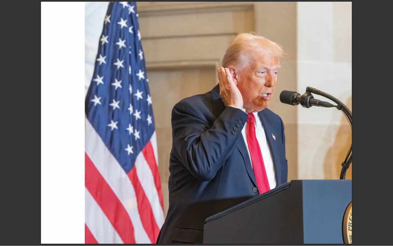 President Donald Trump speaking at the Prayer Breakfast podium
